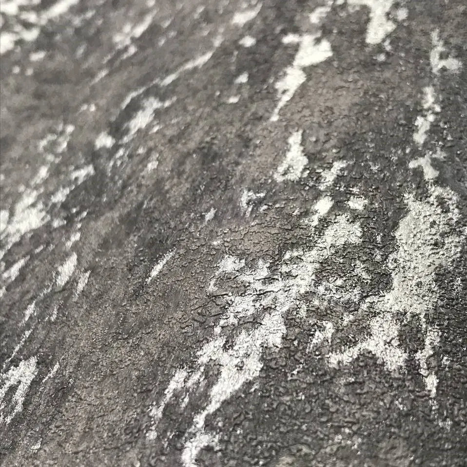 Closeup of a wallpaper showing its Black, Concrete, Contemporary, Embossed, Metallic, Monochrome, Textures pattern, color, and subtle texture.