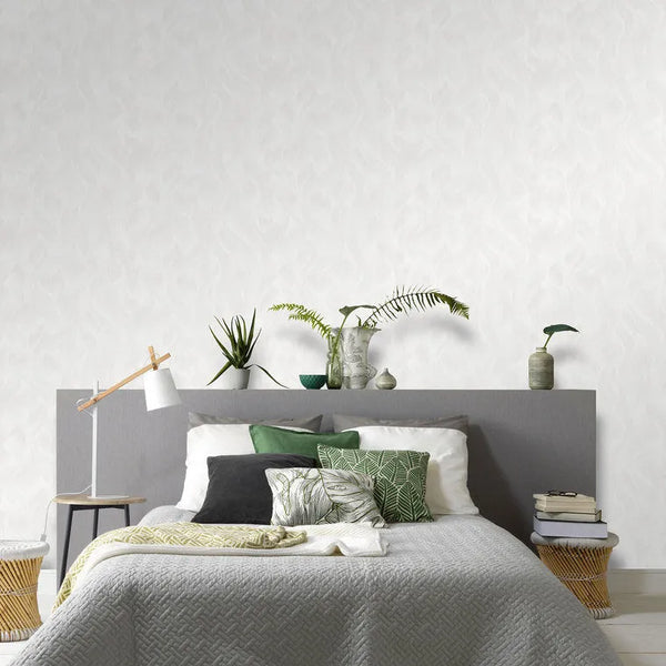 Wallpaper installed in a room showing its full pattern, color