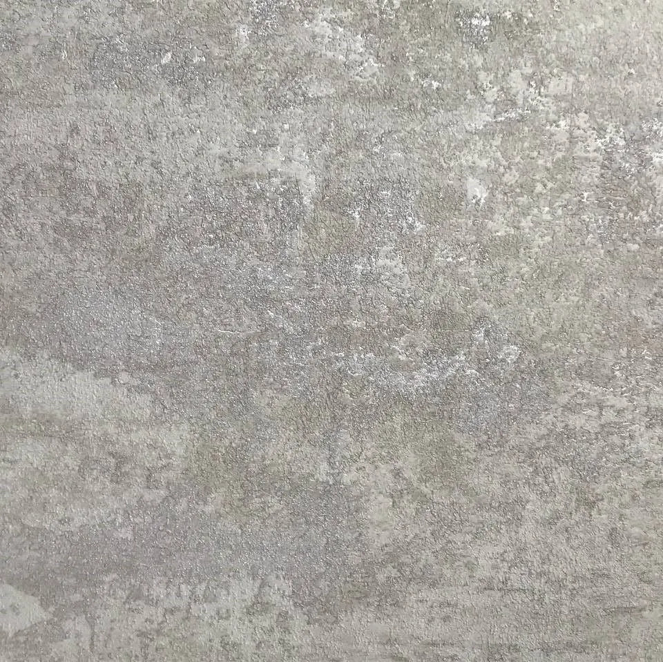 Closeup of a wallpaper showing its Concrete, Contemporary, Embossed, Metallic, Neutrals, Textures pattern, color, and subtle texture.