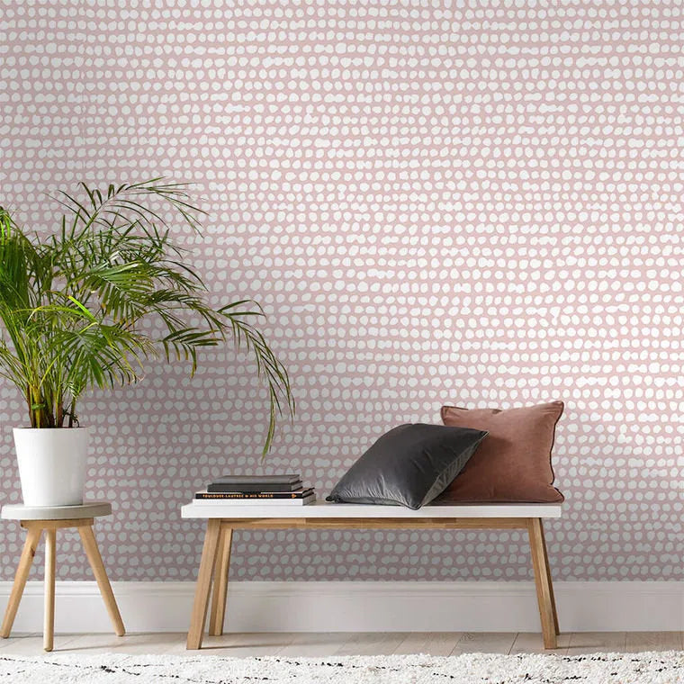 Closeup of a wallpaper showing its Contemporary, Dots, Pink pattern, color, and subtle texture.