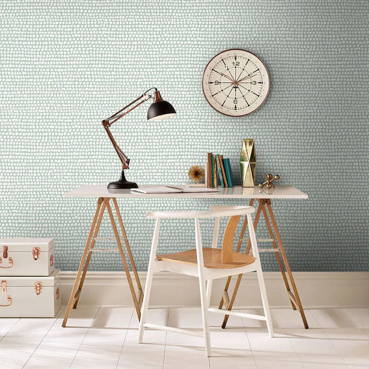 Closeup of a wallpaper showing its Contemporary, Dots, Green pattern, color, and subtle texture.