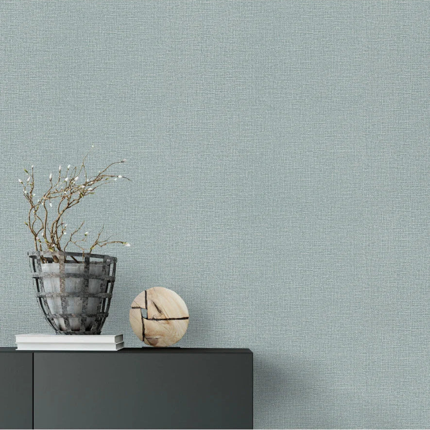Light blue Erismann textured wallpaper in a minimalist interior