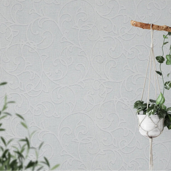 Textured light gray Erismann wallpaper in a natural elegant settting. 
