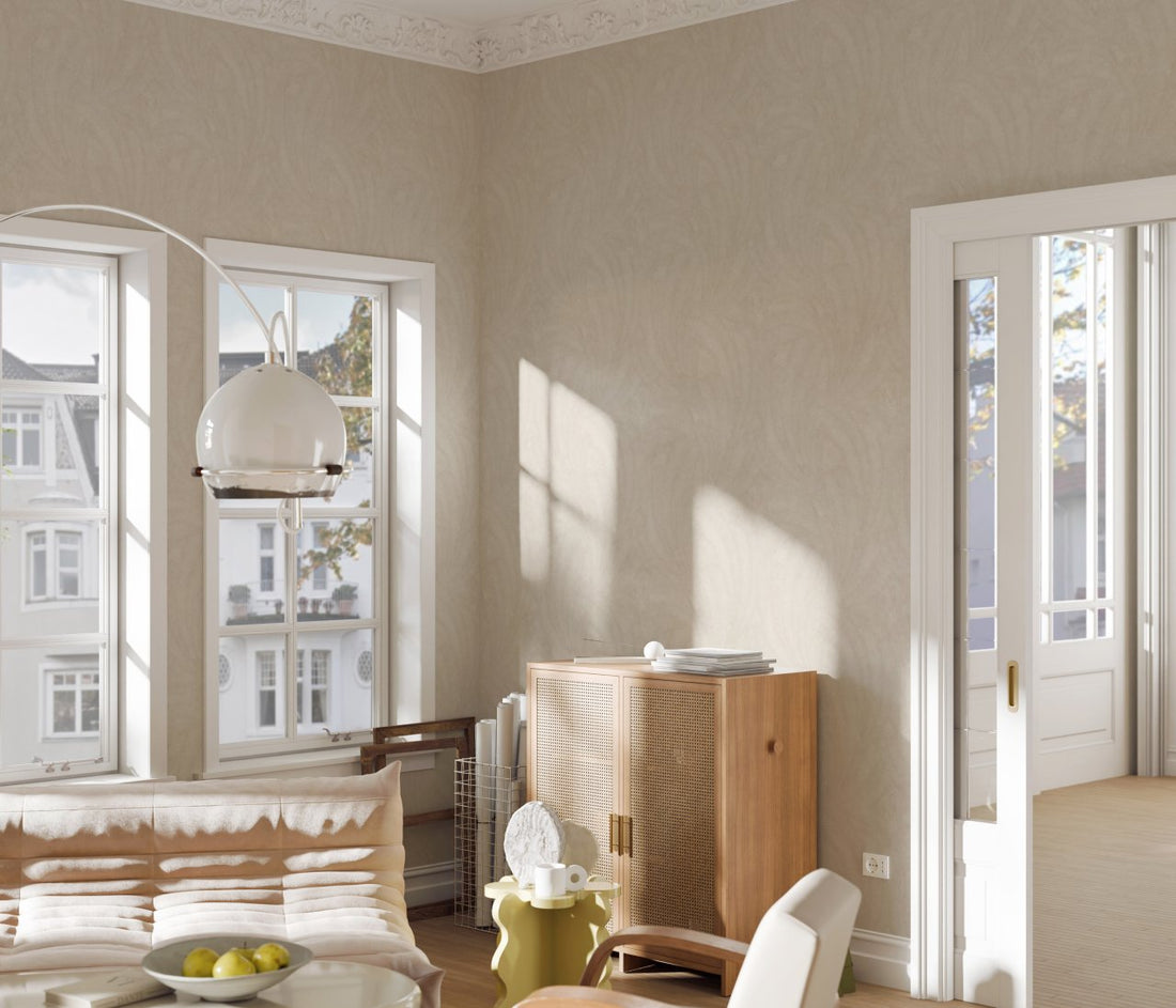 Erismann Elysium subtle botanical wallpaper featuring delicate feather-like leaf textures in soft beige and cream tones, creating a refined, organic pattern with a calm and understated natural elegance.