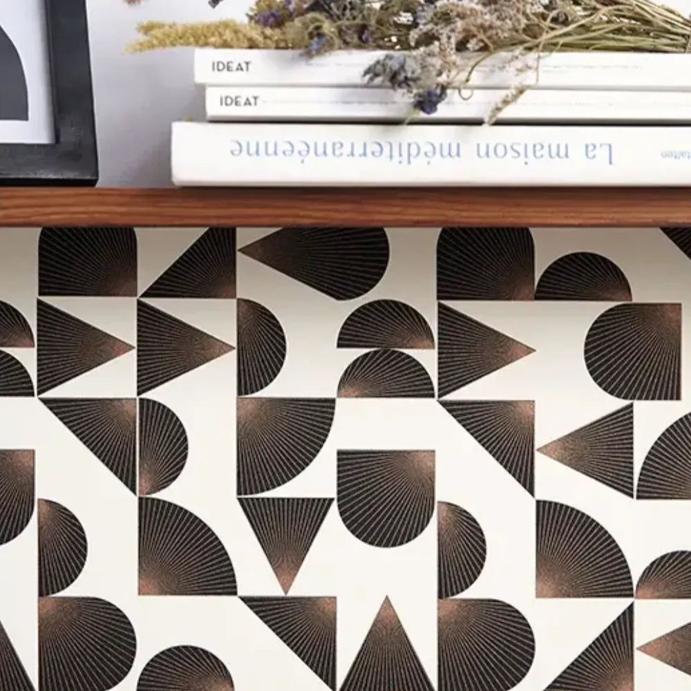 Closeup of a wallpaper showing its Art-Deco, Geometric pattern, color, and subtle texture.