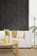 Wallpaper installed in a room showing its full pattern, color