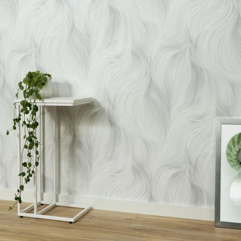 Erismann Fashion for Walls 5 abstract wave wallpaper with fine flowing lines in white, gray, and soft silver tones creating a clean modern textured look.