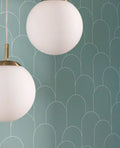 Wallpaper installed in a room showing its full pattern, color