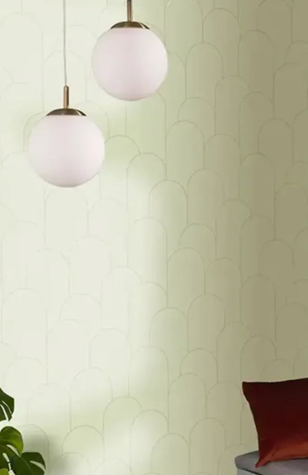 Wallpaper installed in a room showing its full pattern, color