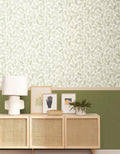 Wallpaper installed in a room showing its full pattern, color