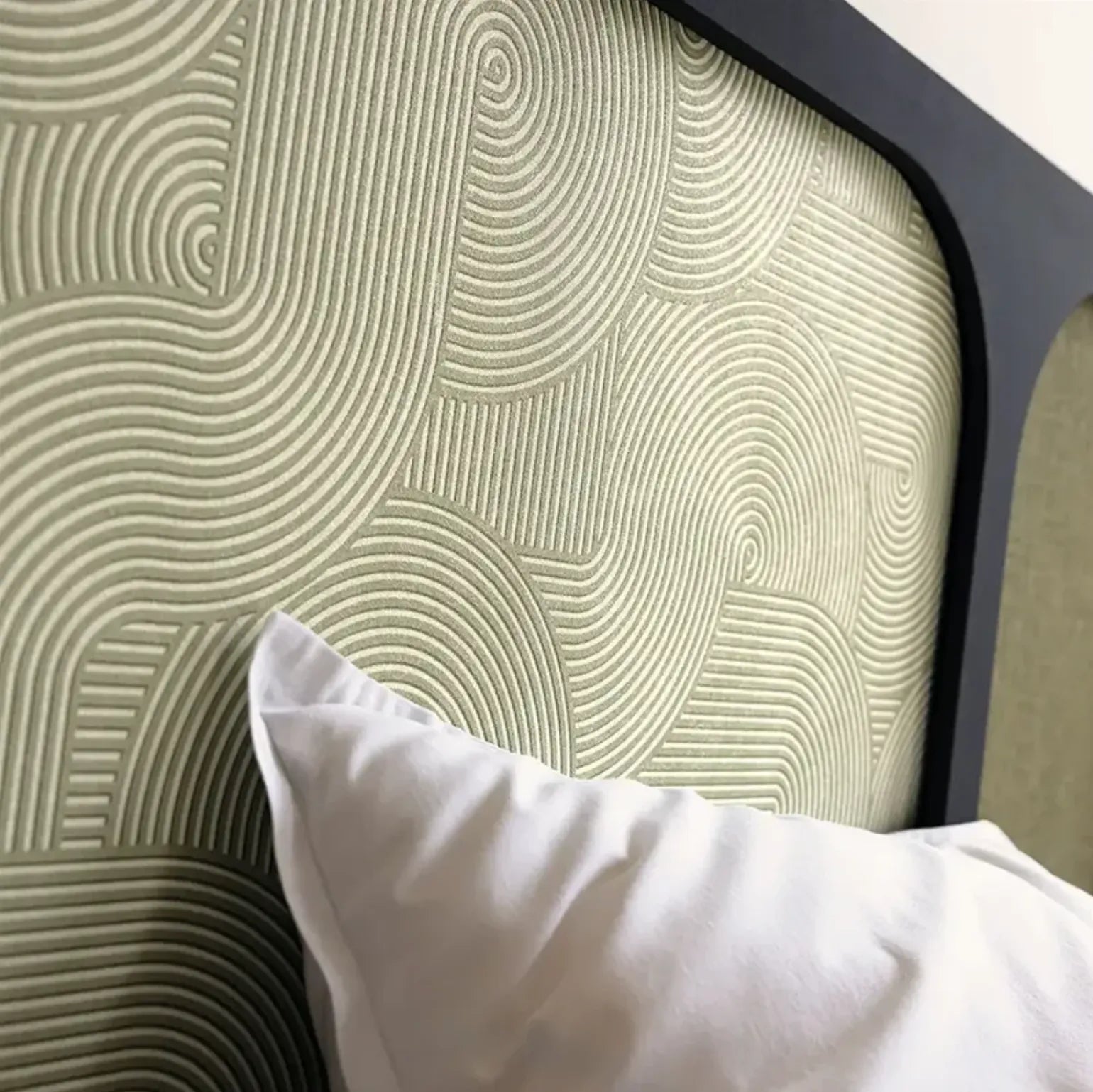 Wallpaper installed in a room showing its full pattern, color