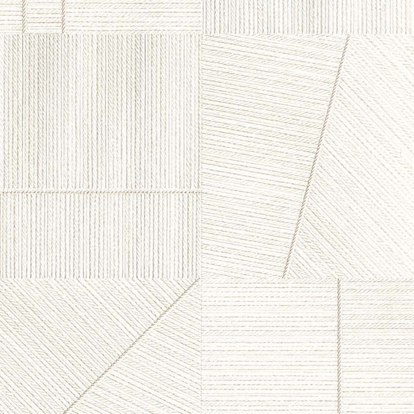 White geometric patterned tile on a white background