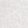 White floral pattern on a textured white background