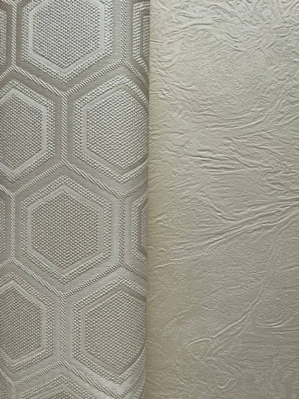 Two textured wall coverings side by side, one with geometric pattern and the other with a more organic surface.
