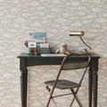 Wallpaper installed in a room showing its full pattern, color