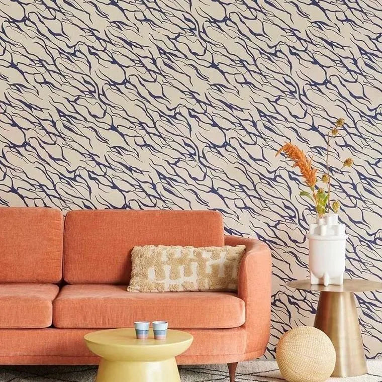 Closeup of a wallpaper showing its Geometric pattern, color, and subtle texture.