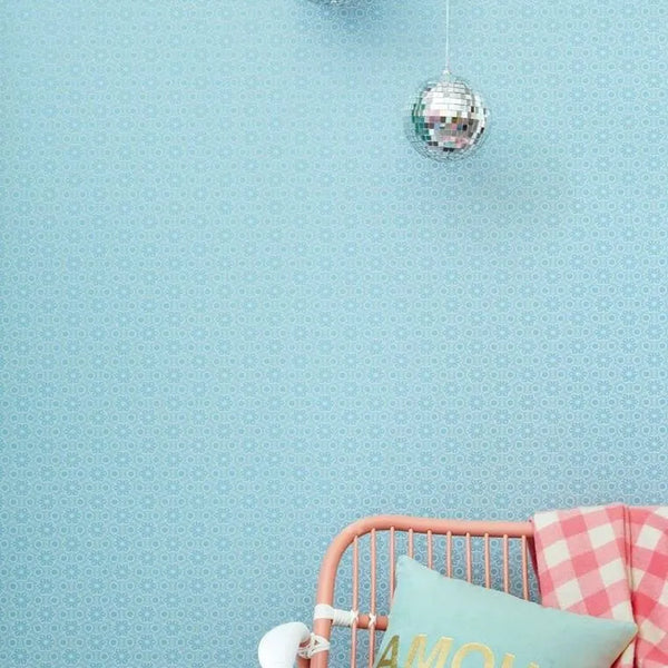 Wallpaper installed in a room showing its full pattern, color