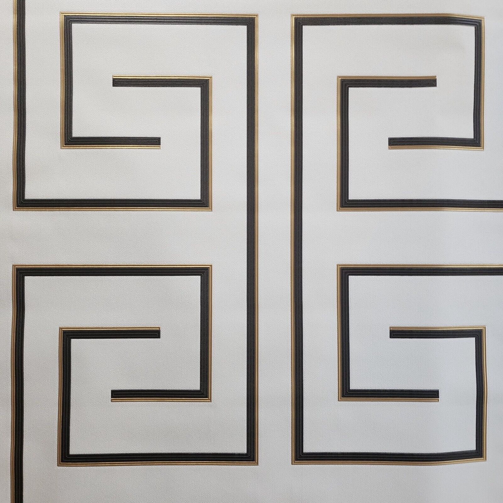 Decorative wallpaper with geometric patterns on a light background