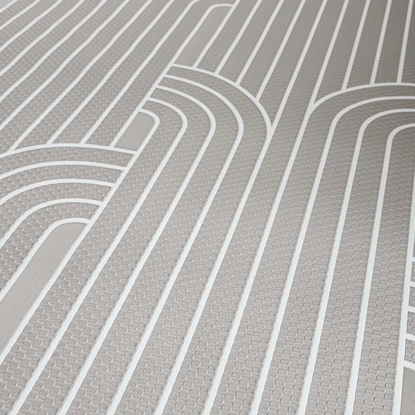 Close-up of a gray wallpaper with curved lines