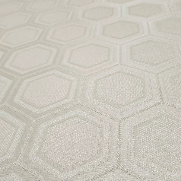 Textured wallpaper with a geometric hexagonal pattern in light gray.