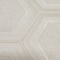 Close-up of textured cream wallpaper with a subtle pattern