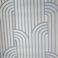 Patterned wallpaper with wavy lines in blue and gray on a textured background