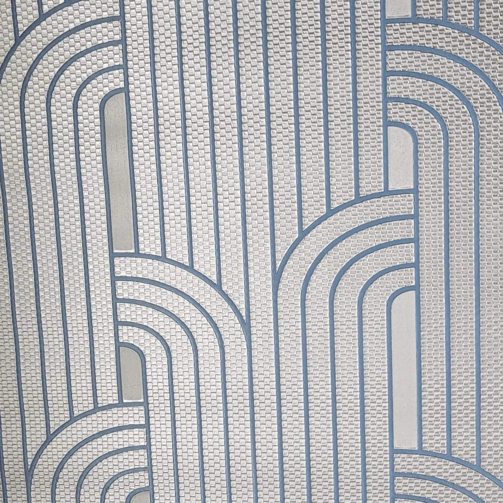 Patterned wallpaper with wavy lines in blue and gray on a textured background