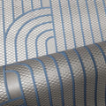 Close-up of a textured wallpaper with blue and gray pattern