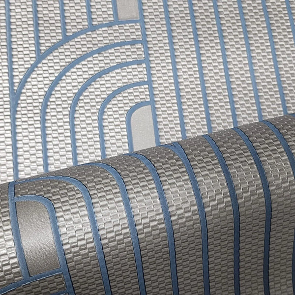 Close-up of a textured wallpaper with blue and gray pattern