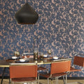 Wallpaper installed in a room showing its full pattern, color