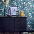 Wallpaper installed in a room showing its full pattern, color