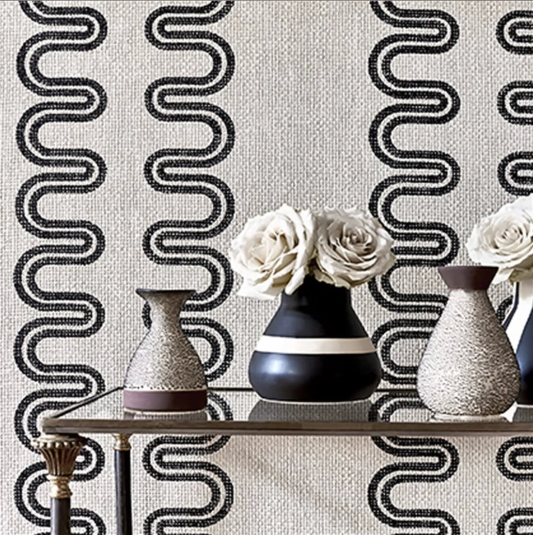 Closeup of a wallpaper showing its Art-Deco, Contemporary, Neutrals, Two-tone pattern, color, and subtle texture.