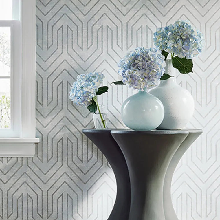 Closeup of a wallpaper showing its Art-Deco, Chevron, Neutrals, Two-tone pattern, color, and subtle texture.