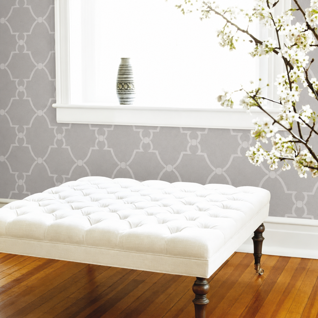 Closeup of a wallpaper showing its Art-Deco, Damask, Two-tone pattern, color, and subtle texture.