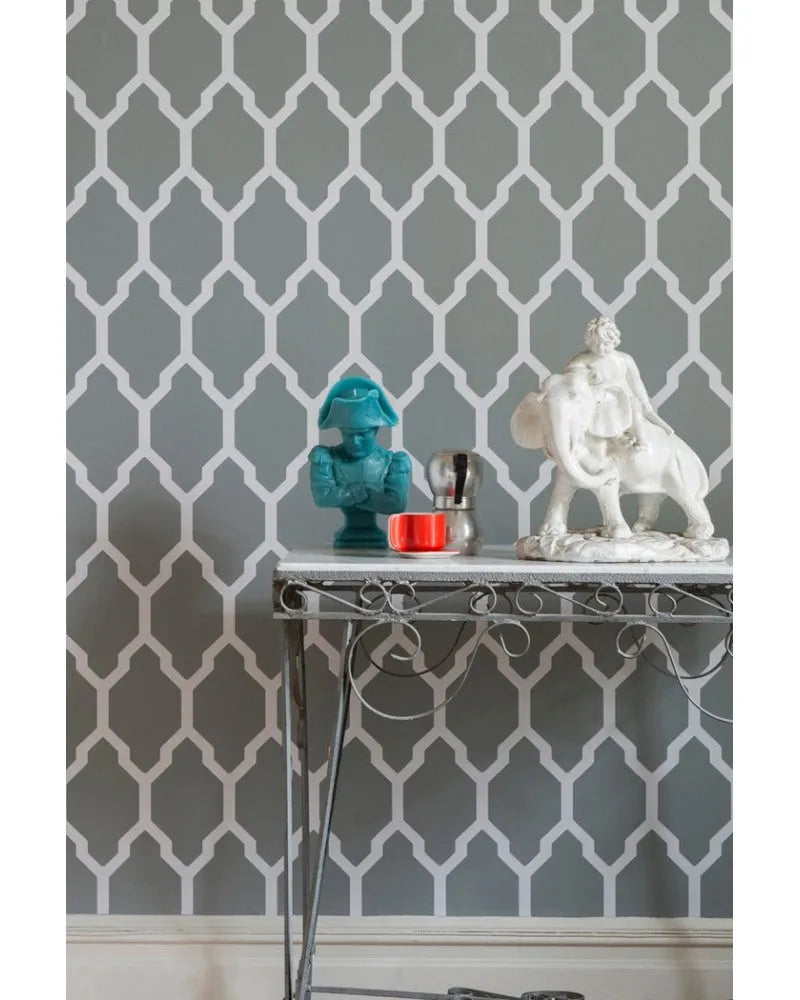 Closeup of a wallpaper showing its Contemporary, Geometric, Green, Metallic, Trellis, Two-tone pattern, color, and subtle texture.