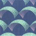 Closeup of a wallpaper showing its Contemporary pattern, color, and subtle texture.