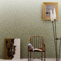 Wallpaper installed in a room showing its full pattern, color