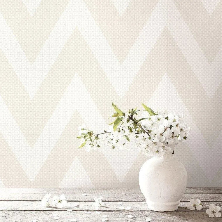 Closeup of a wallpaper showing its Chevron, Cream, Neutrals, Paperweave, Two-tone pattern, color, and subtle texture.