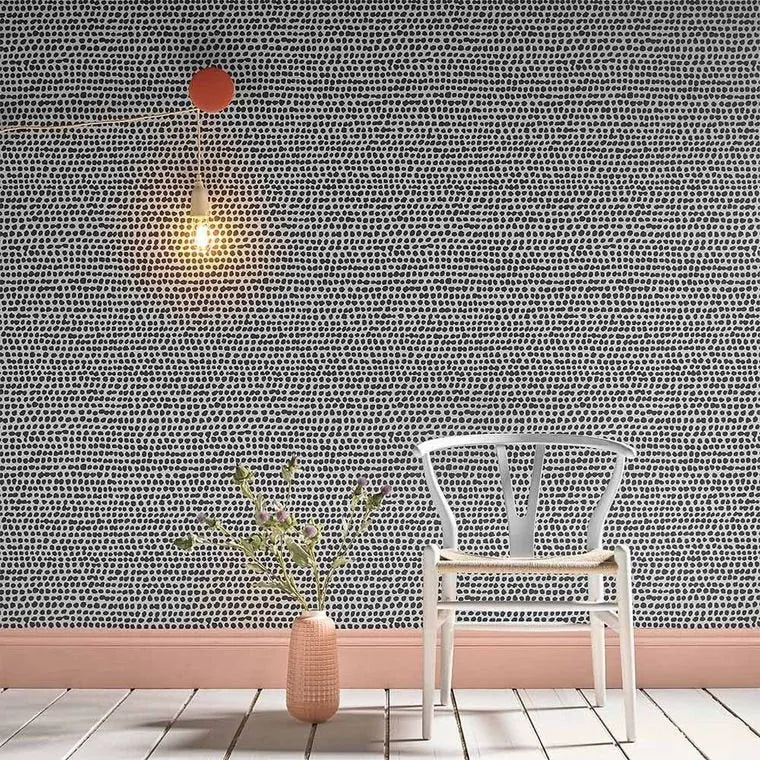 Closeup of a wallpaper showing its Black, Contemporary, Dots, Monochrome pattern, color, and subtle texture.