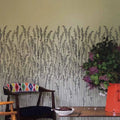 Wallpaper installed in a room showing its full pattern, color