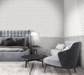 Modern bedroom with gray upholstered furniture and patterned wallpaper.