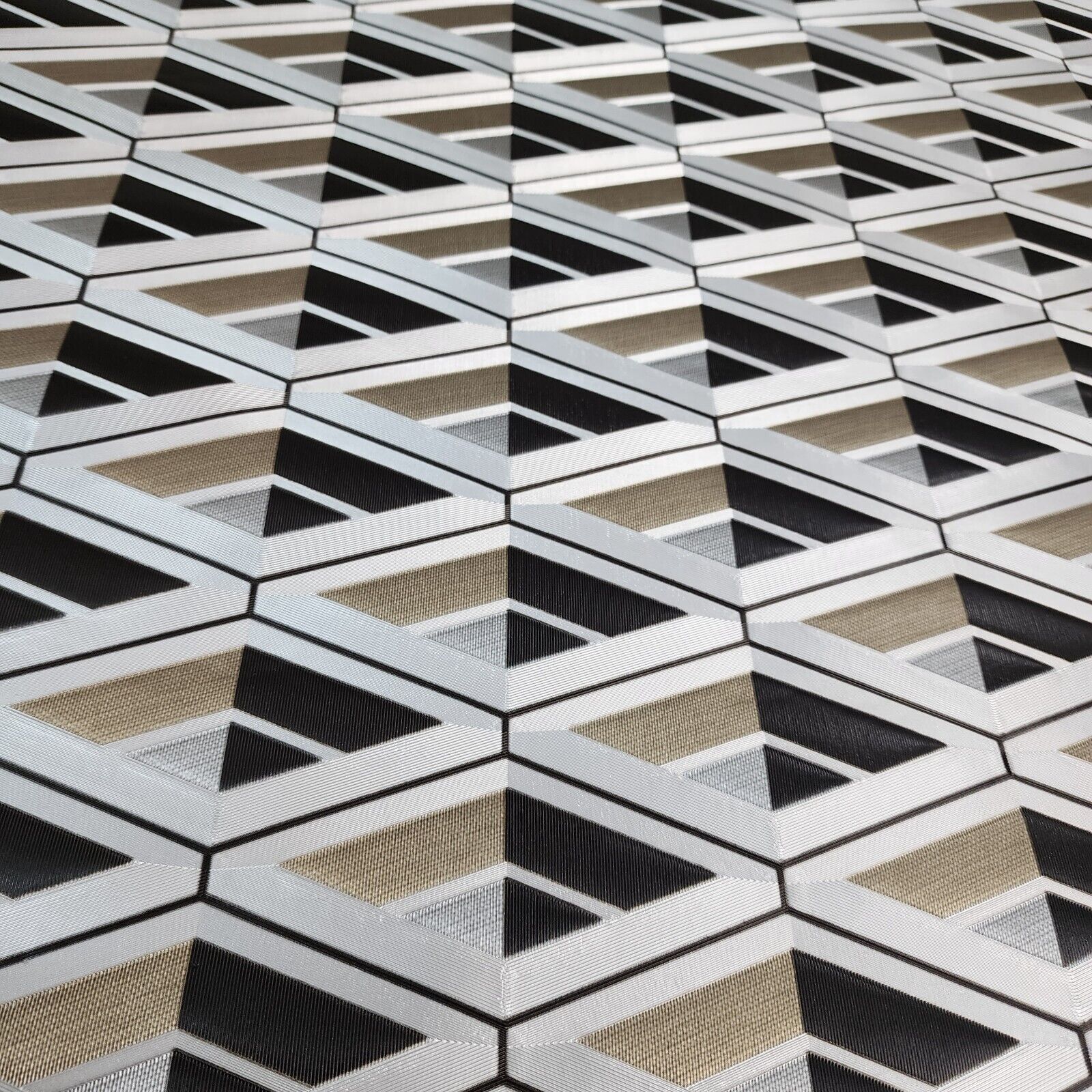 Geometric patterned wallpaper with black, white, and beige colors.