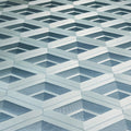 Geometric patterned wallpaper with blue and white design