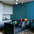 Modern kitchen with blue diamond patterned wallpaper.