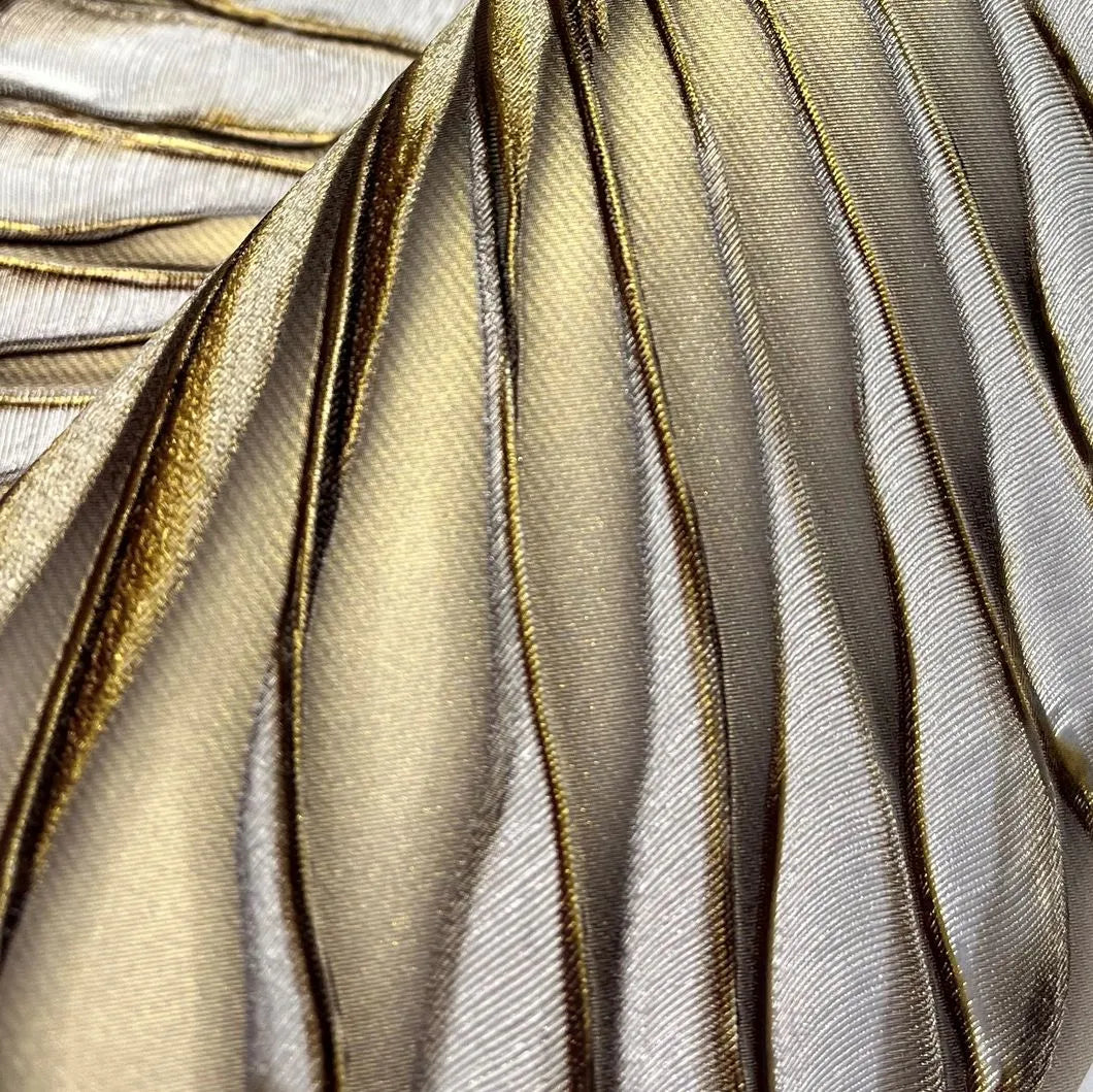 Closeup of a wallpaper showing its Art-Deco, Gold, Luxury, Textures, Vinyl pattern, color, and subtle texture.