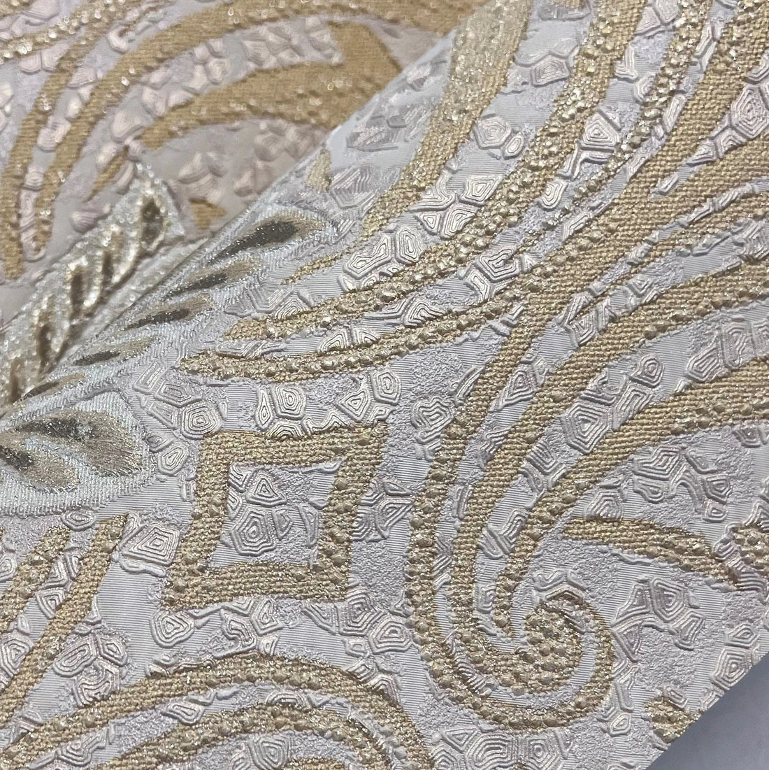 Closeup of a wallpaper showing its Damask, Luxury, Textures, Vinyl pattern, color, and subtle texture.