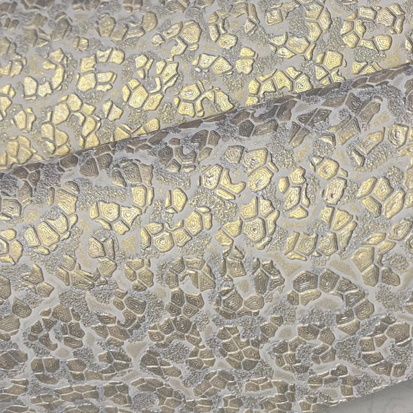 Wallpaper installed in a room showing its full pattern, color