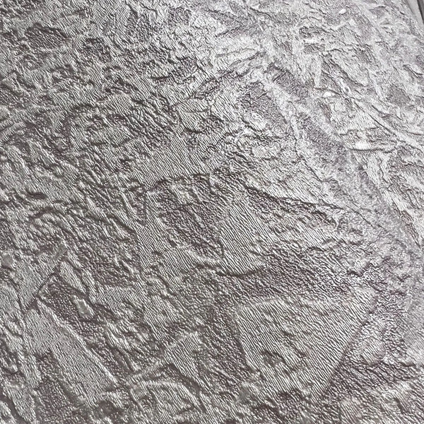 Wallpaper installed in a room showing its full pattern, color