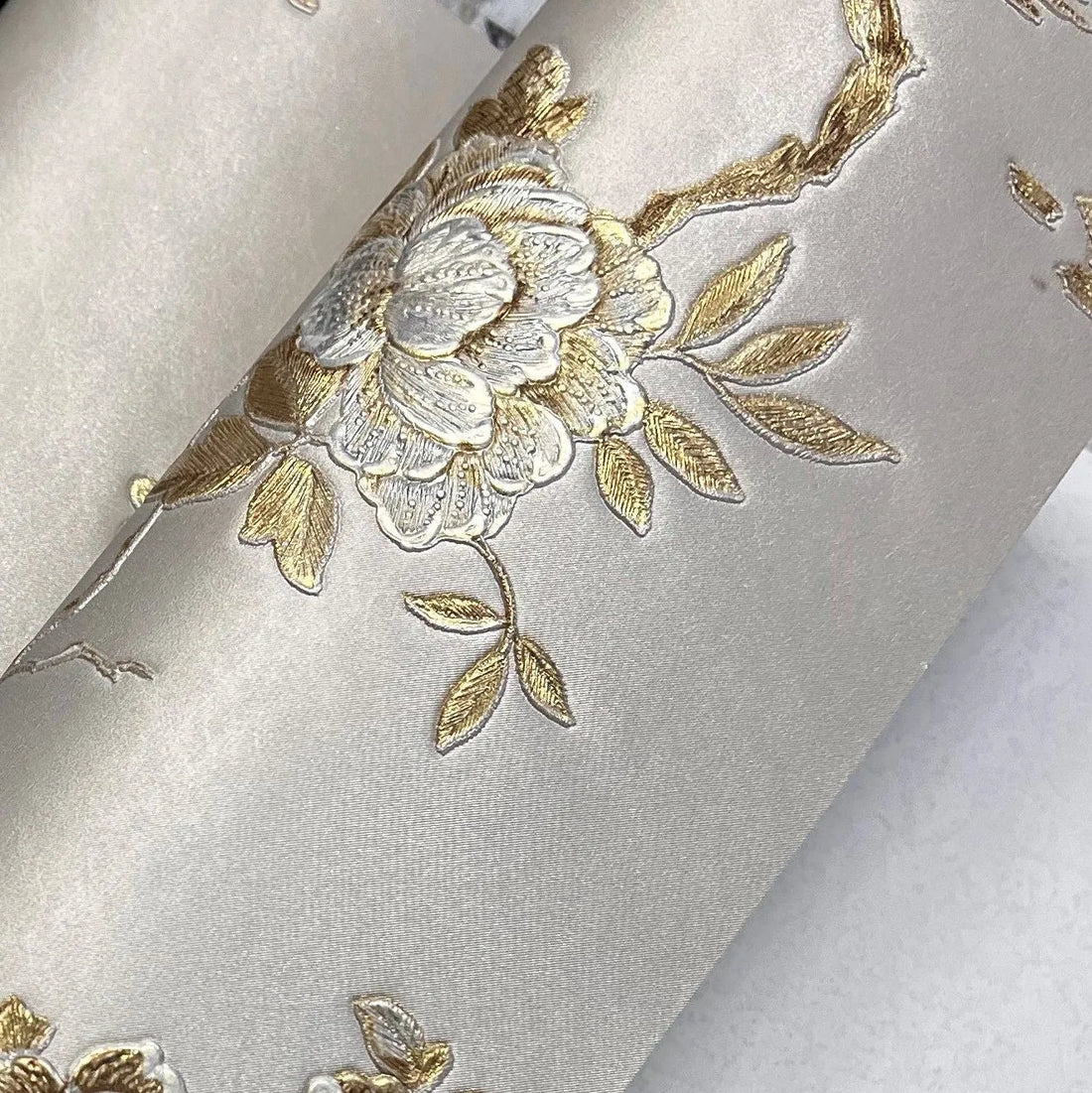 Closeup of a wallpaper showing its Birds, Floral, Gold, Luxury, Nature, Silver, Textures, Vinyl pattern, color, and subtle texture.