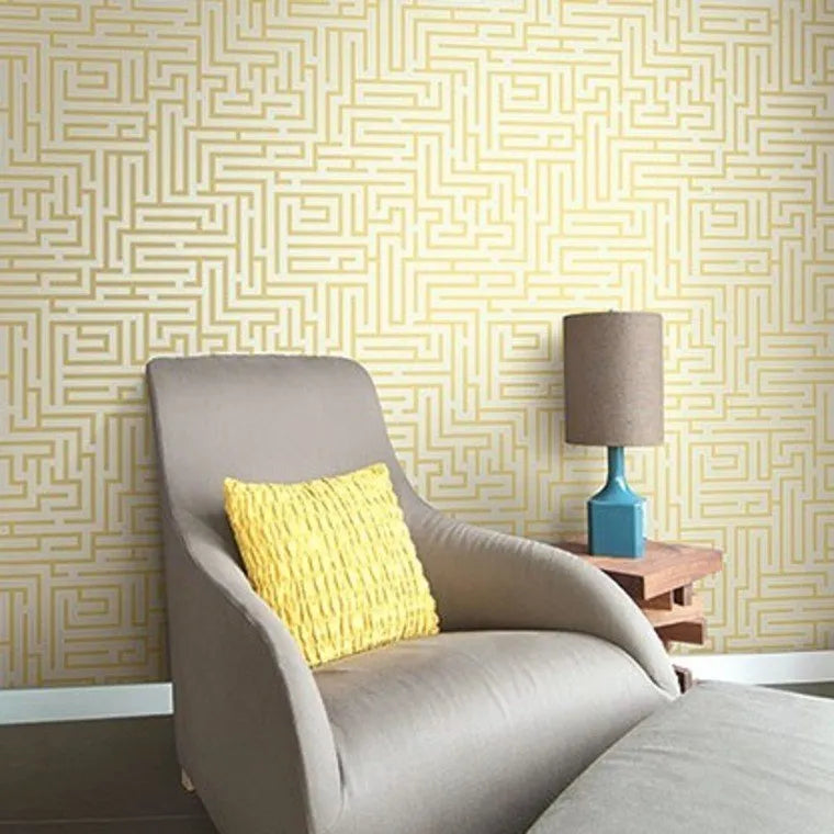 Closeup of a wallpaper showing its Geometric, Gold, Greek pattern, color, and subtle texture.